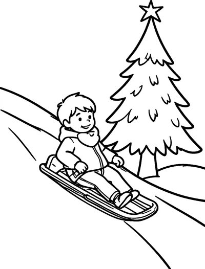 A smiling boy in a warm coat rides a sled down a snowy hill past a tall star-topped tree.