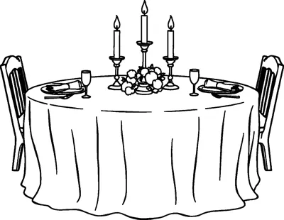A round table with a long cloth, three lit candles, a fruit centerpiece, plates, glasses and two chairs.